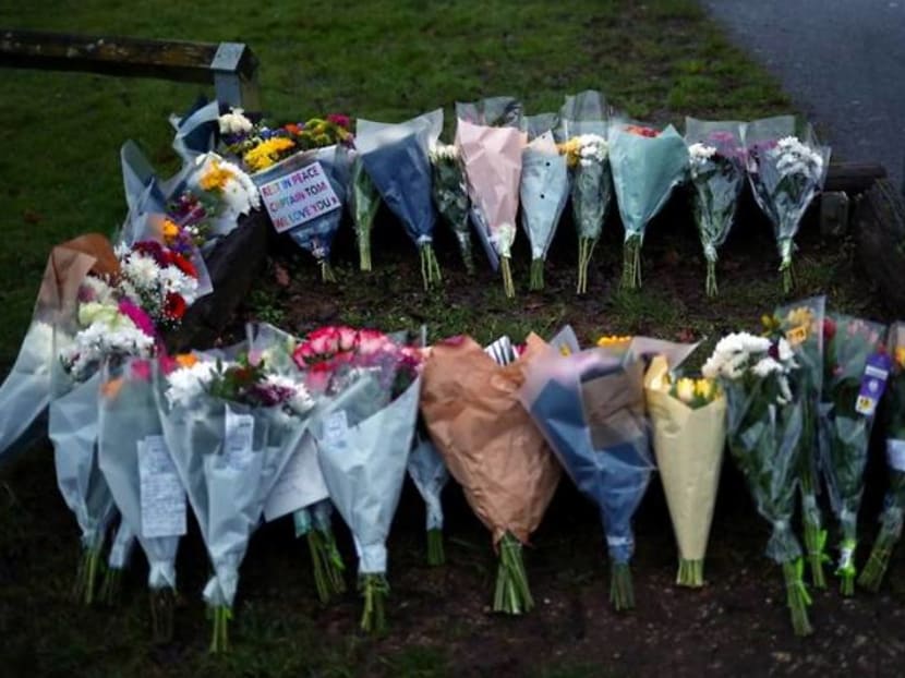 With tears and flowers, Britain mourns 'hero' Captain Tom Moore With tears and flowers, Britain mourns 'hero' Captain Tom Moore