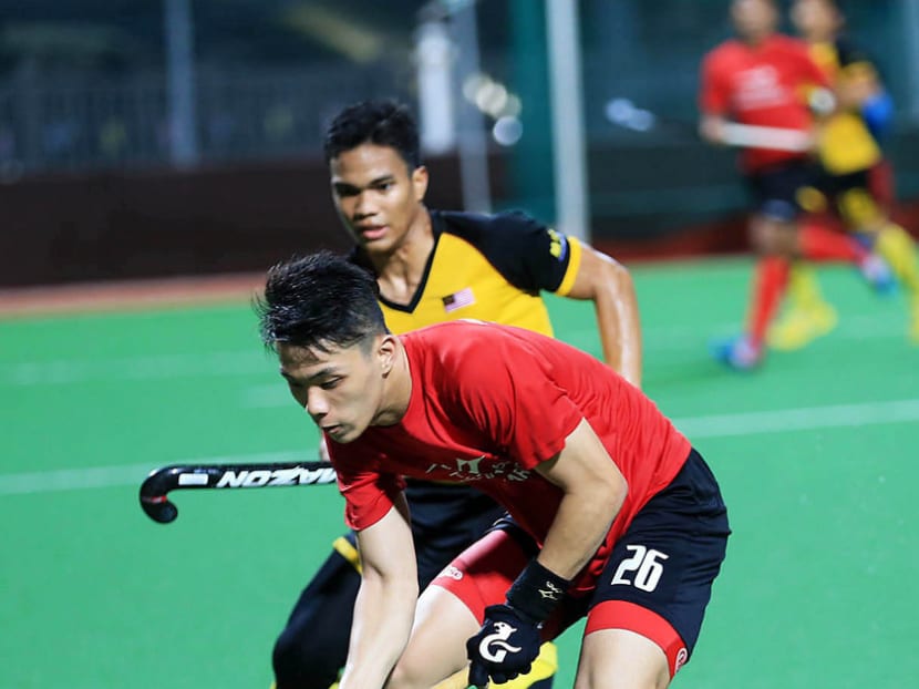 Singapore (in red) took on Malaysia in a series of friendlies earlier this month as part of their preparations for the SEA Games. Photo: Wee Teck Hian