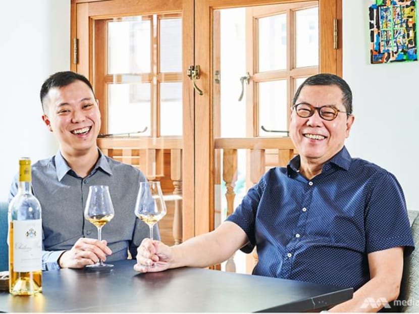 Who is the father-and-son team behind one of Singapore's top wine distributors?