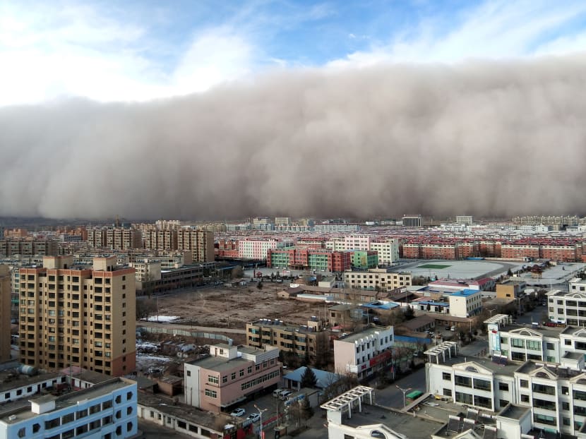 Photo of the day: A sandstorm hits the city of Zhangye in Gansu province, China.