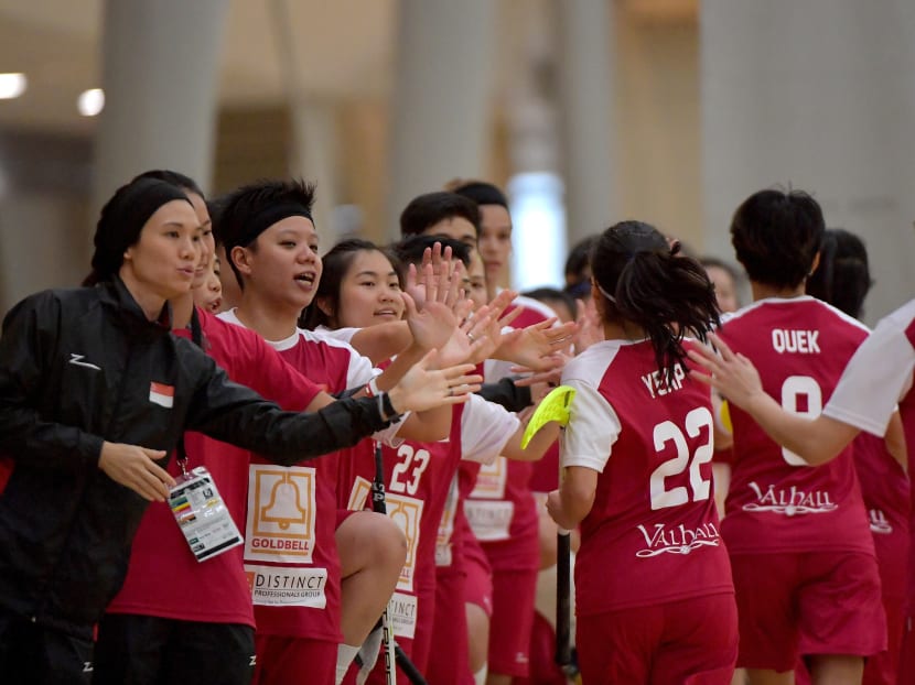 Singapore's women national floorball team celebrating a goal. They have qualified for the year-end world championships. Photo: International Floorball Federation