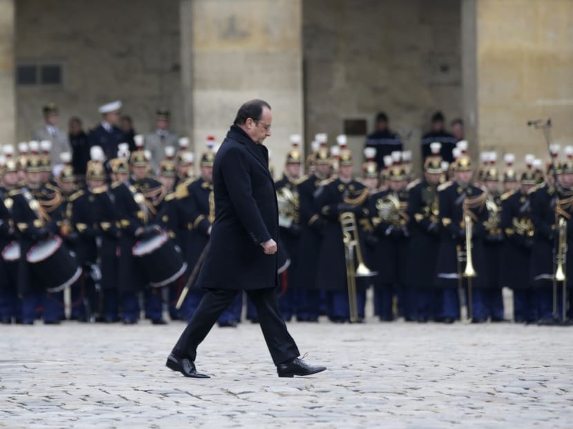 Gallery: France honours attack victims in city subdued by mourning