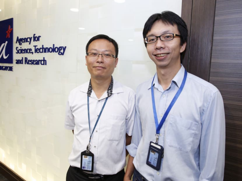 (From left): Dr Yan Hong and Dr Kwok Sen Wai, both are from A*STAR Institute of Materials Research and Engineering, at the Agency for Science, Technology and Research, on the 24th of June 2016. They will be exhibiting the Invisible Raincoat Material at the X-Periment! Exhibition, which is part of the Singapore Science Festival 2016. Photo: Damien Teo