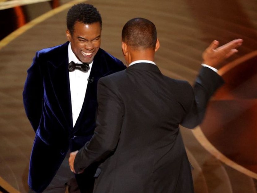 Will Smith smacks Chris Rock on stage, then apologises upon winning Oscar