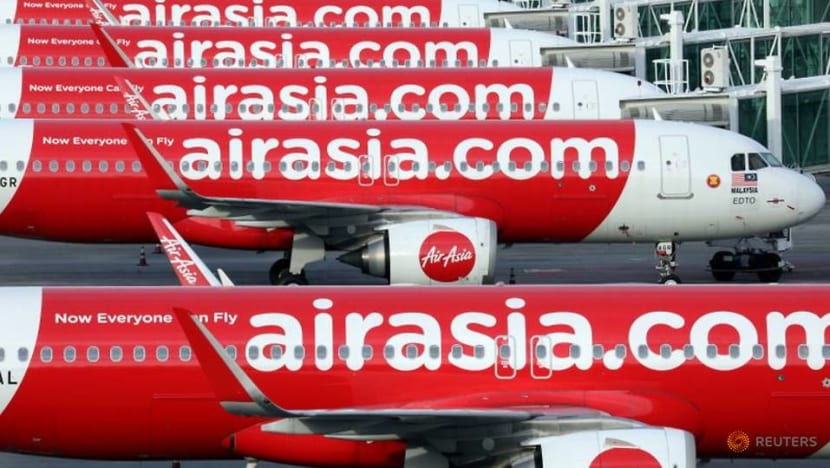 Malaysia's AirAsia shares slide after record quarterly loss Malaysia's AirAsia shares slide after record quarterly loss