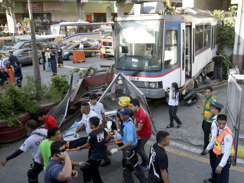 Gallery: Philippine train rams barrier, leaves scores injured