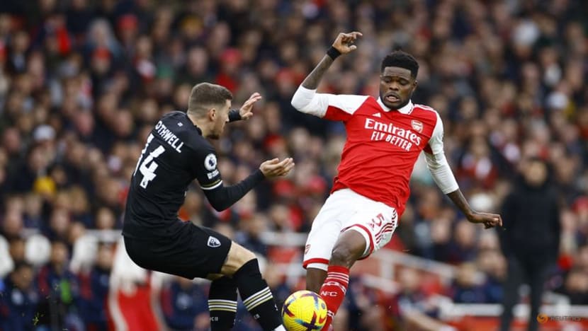 Nelson keeps Arsenal on course in title race with late winner Nelson keeps Arsenal on course in title race with late winner