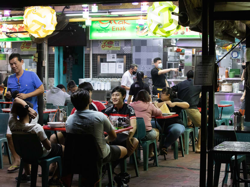 People having supper at Enak Enak Hong Kong Tea House in Bedok Road on Friday (June 19). People having supper at Enak Enak Hong Kong Tea House in Bedok Road on Friday (June 19).