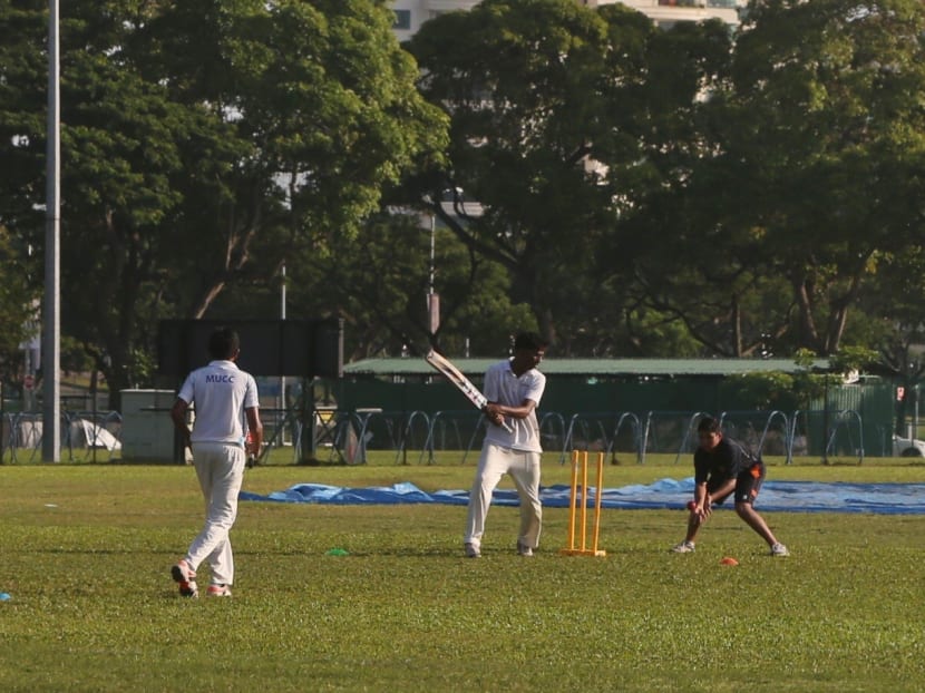 Cricketers practice at Kallang Cricket Field in this file photo. Photo: Ooi Boon Keong