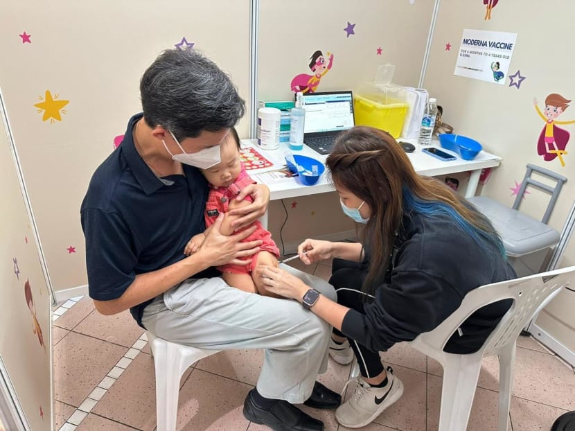A child is seen here getting vaccinated against Covid-19 with the Moderna vaccine. 