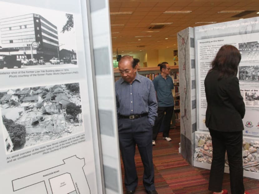 Guests and members of the public at the National Heritage Board's (NHB) first exhibition under its Resilience Through Heritage series, which focuses on the Hotel New World tragedy in 1986, at Ang Mo Kio Library on June 19, 2012. TODAY file photo