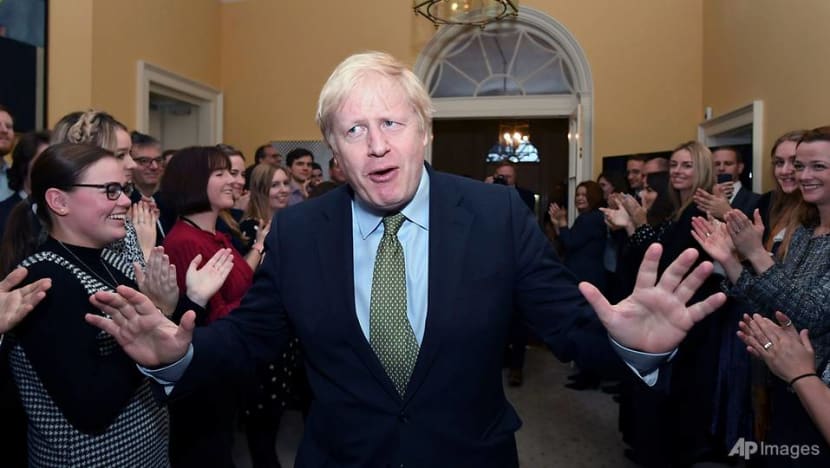 Victorious Johnson urges Britain to move past Brexit splits Victorious Johnson urges Britain to move past Brexit splits