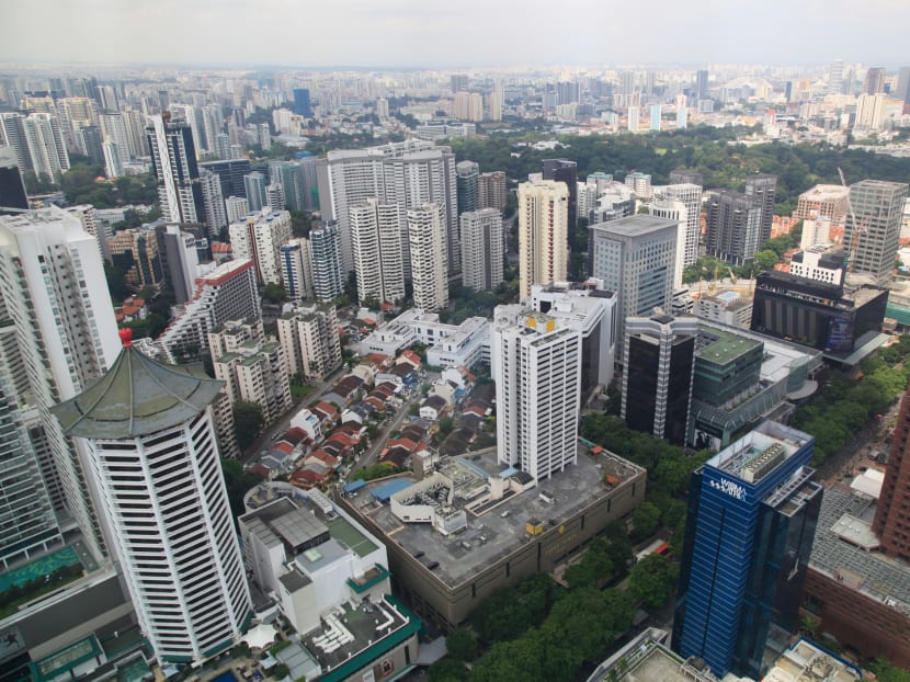 Apartment blocks and houses in the Cairnhill area, adjacent to Orchard Road. Data suggests that District 9 is where buyers, both local and foreigners, purchase homes for investments.
Photo: Bloomberg