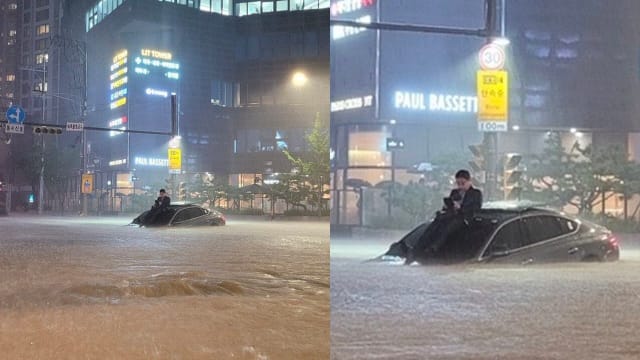韩国暴雨成灾 西装男坐车顶滑手机爆红