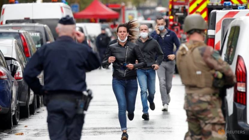 Knifeman in Paris wounds two at scene of Charlie Hebdo attacks Knifeman in Paris wounds two at scene of Charlie Hebdo attacks