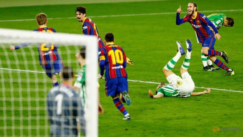 Late Trincao strike gives Barca comeback victory over Betis Late Trincao strike gives Barca comeback victory over Betis