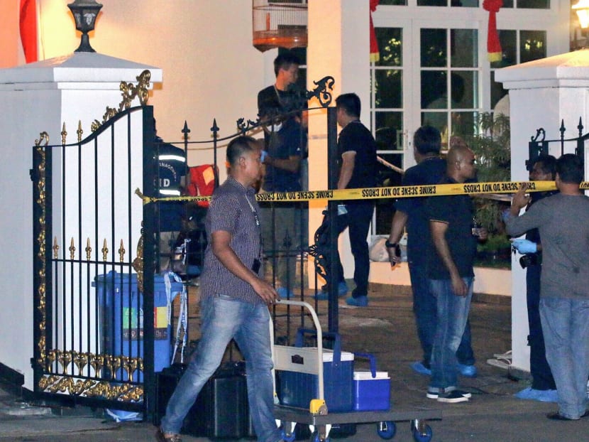 The scene at a house on Lorong H Telok Kurau in Joo Chiat in June 2016, after investigators responded to a case where Seow Kim Choo was stabbed 94 times by her domestic worker there.