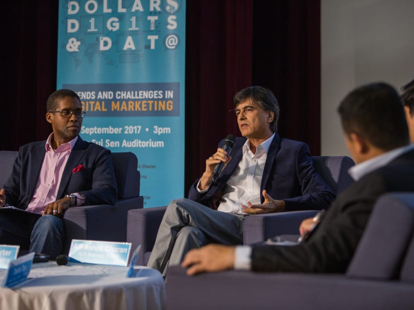 Assoc Prof Ashok Charan of NUS Business School (with microphone) says marketers need to understand their audiences in their totality and engage with consumers as they weave their way in and out of different media. Photo: NUS Business School.