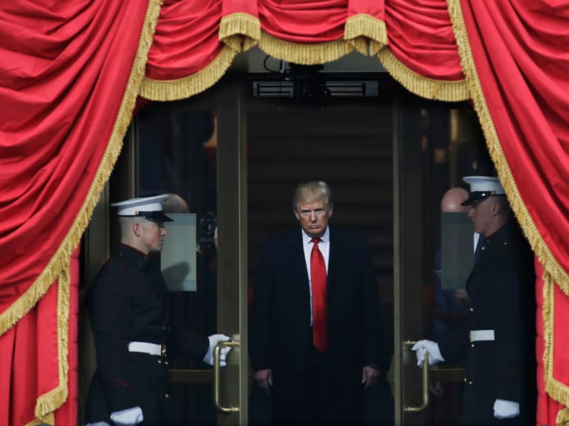 Donald Trump steps out to the portico to be sworn in as 45th president of the United States during the 58th Presidential Inauguration at the US Capitol in Washington on Jan 20, 2017. Photo: AP