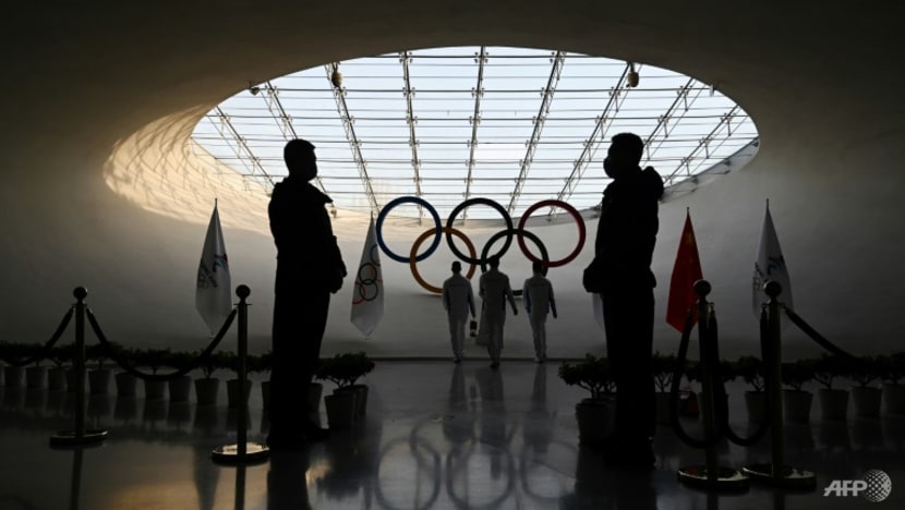 Police escorts, hazmat suits - welcome to Beijing's Olympic bubble