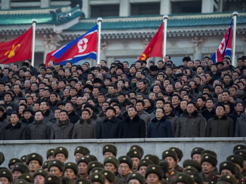North Koreans attend a mass rally to celebrate the North's declaration last month it had achieved full nuclear statehood.  China has been warned that it must be ready for a war on the Korean peninsula, with the risk of conflict higher than ever before. Photo: AFP