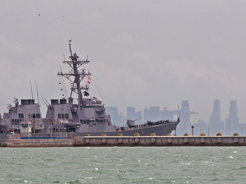 USS John S McCain, which was involved in a collision with a tanker near Pedra Branca, being towed towards Changi Naval Base. Photo: Wee Teck Hian