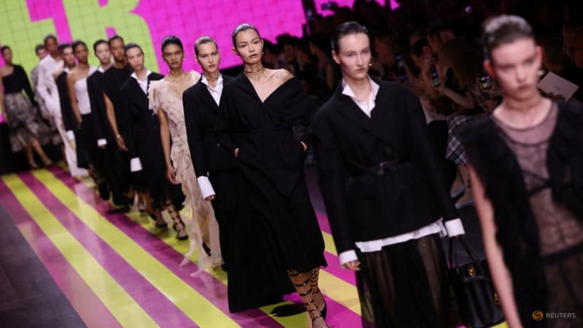 Dior shows frayed edges and bare shoulders at Paris Fashion Week