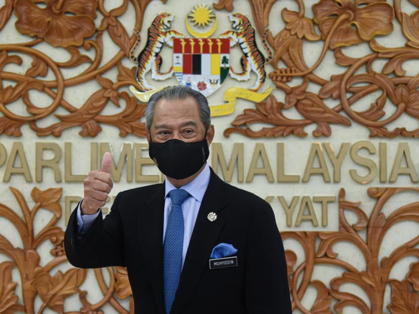 Malaysia's Prime Minister Muhyiddin Yassin poses for a picture at Malaysian Parliament in Kuala Lumpur.