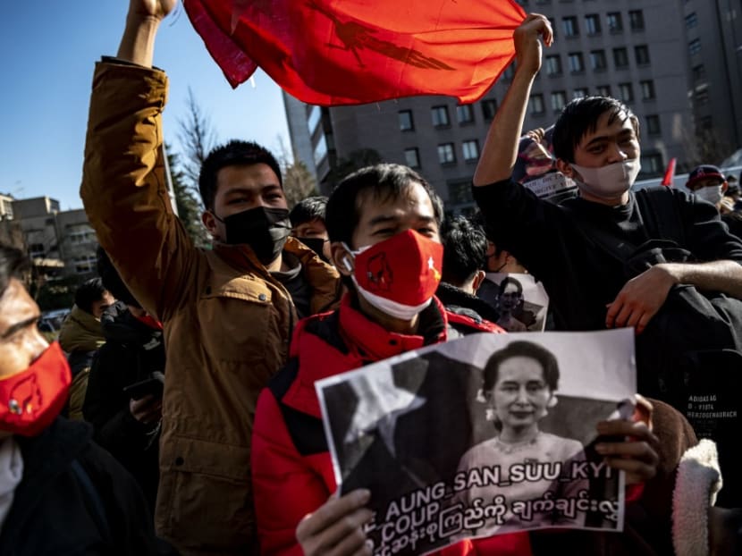 A group of Myanmar activists protest outside the United Nations University building in Tokyo on Feb 1, 2021, after Myanmar's military seized power in a bloodless coup and detaining democratically elected leader Aung San Suu Kyi as it imposed a one-year state of emergency.
