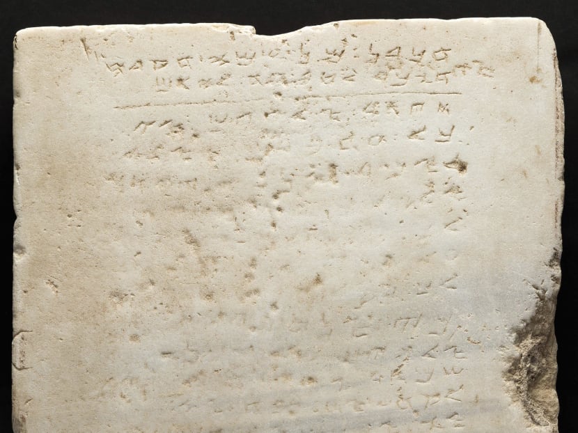 The world’s earliest-known stone inscription of the Ten Commandments – a 61cm square slab of white marble, weighing about 52kg and inscribed in an early Hebrew script called Samaritan. Photo: Heritage Auctions bia AP