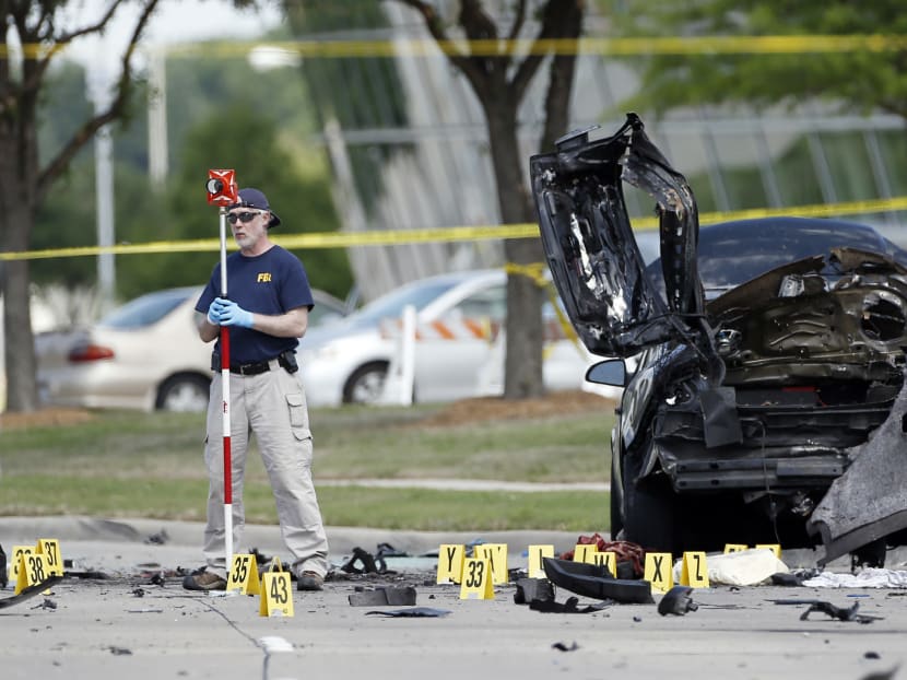 FBI crime scene investigators document evidence outside the Curtis Culwell Center, Monday, May 4, 2015, in Garland, Texas. Photo: AP