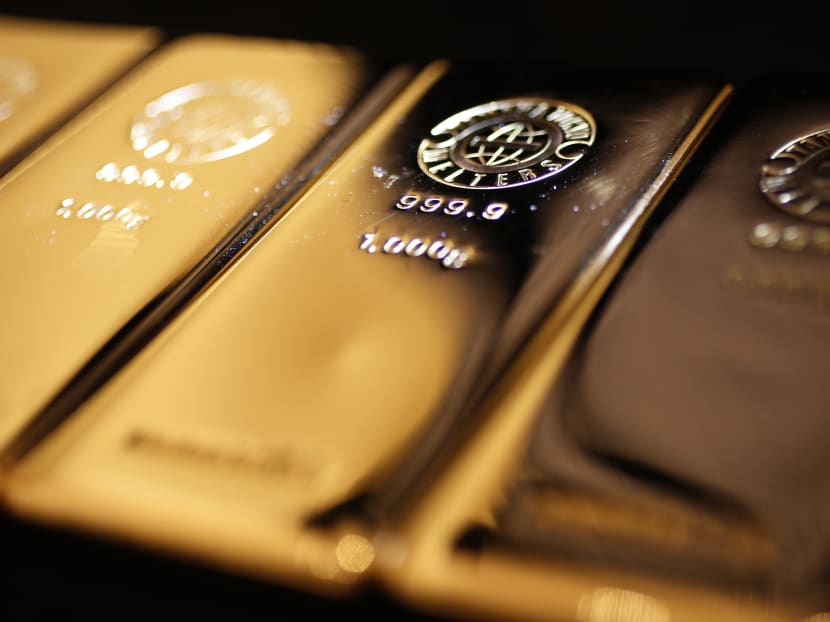 Gold bars are displayed at a store in Tokyo. Japanese authorities have warned international gold smuggling rings are becoming more sophisticated after cracking a scheme to conceal gold bars in aircraft toilets. Photo: Reuters