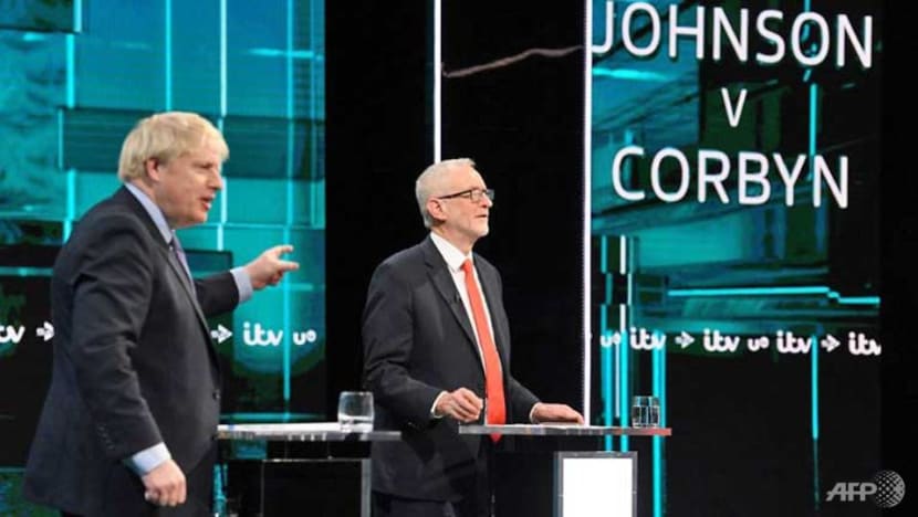 British PM and Labour leader spar over Brexit in first election debate British PM and Labour leader spar over Brexit in first election debate