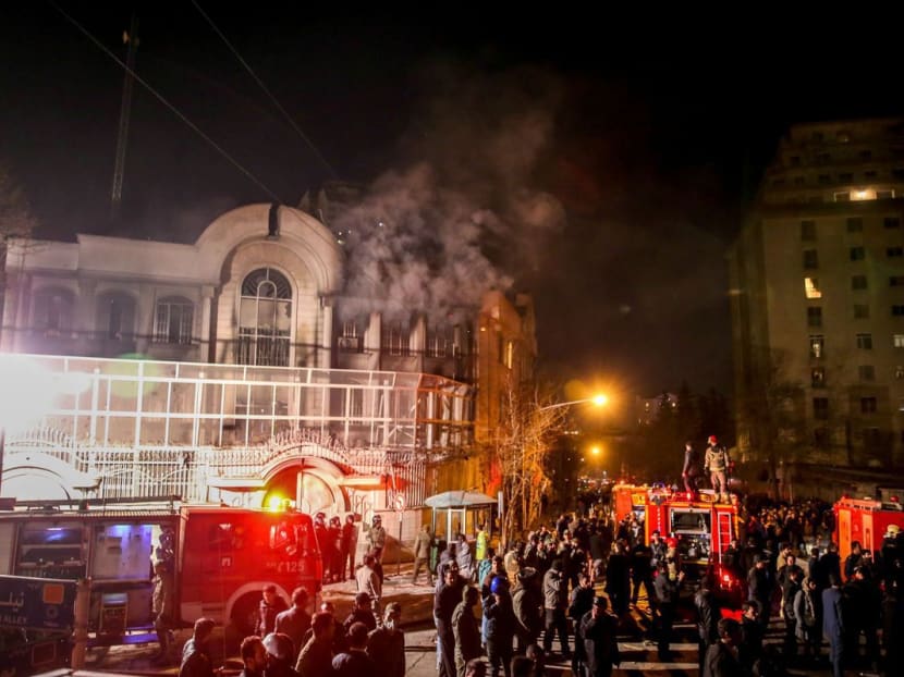 Iranian protesters set fire to the Saudi Embassy in Tehran during a demonstration. Photo: AFP
