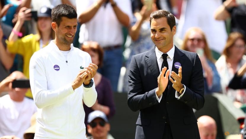 Federer hints at Wimbledon comeback on surprise visit Federer hints at Wimbledon comeback on surprise visit