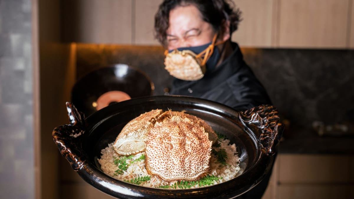 at-les-amis-group-s-new-omakase-restaurant-the-japanese-chef-wears-a-crab-shell-mask