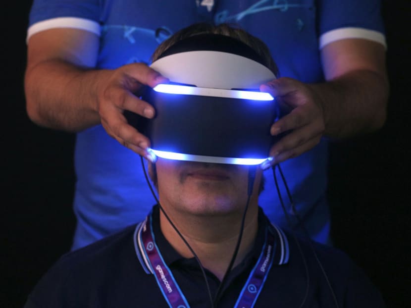 Virtual reality uses a headset to block out old-fashioned reality and replace it with a computerised version. Virtual reality is becoming less popular in favour of ‘augmented’ and ‘mixed’ reality. Photo: Reuters