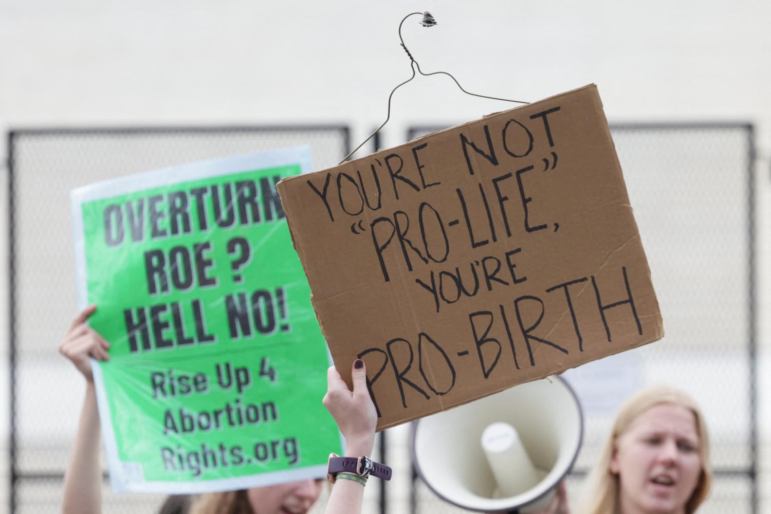 <p>Abortion rights demonstrators protest outside the United States Supreme Court as the court rules in the Dobbs v Women’s Health Organization abortion case, overturning the landmark Roe v Wade abortion decision in Washington, US, on June 24, 2022.&nbsp;&nbsp;</p>
