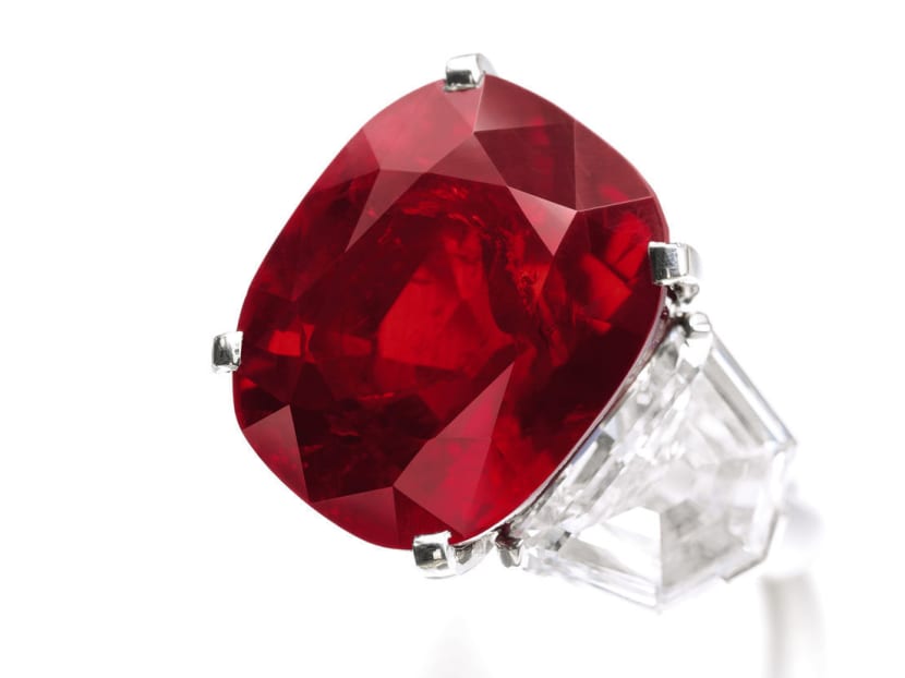 The so-called, Sunrise Ruby, which weighs 25.59 carats, exceeded estimates that ranged from US$12 million (S$16 million) to US$18 million. Photo: Bloomberg