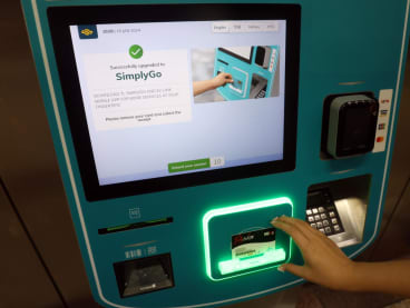 A successful upgrade of an Ez-link adult card to a SimplyGo Ez-link card at a ticketing machine in City Hall on Jan 15, 2024.