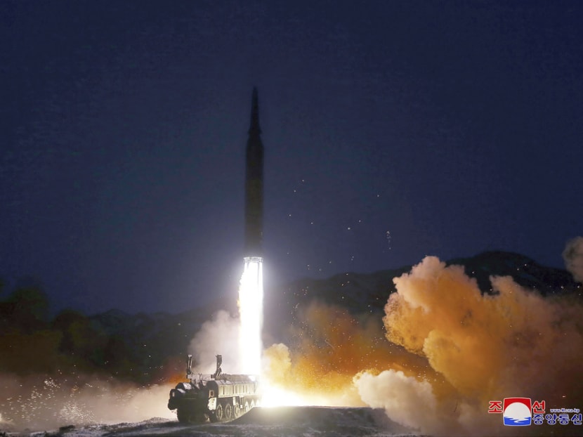 North Korea fires missile, warns of strong action over US sanctions push