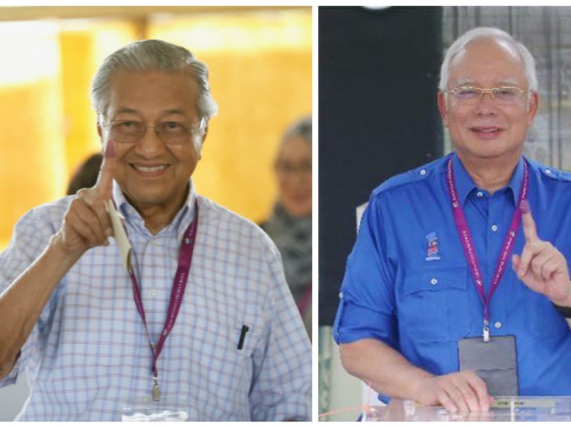 Dr Mahathir Mohamad of the opposition Pakatan Harapan coalition (left) and Prime Minister Najib Razak of the Barisan Nasional coalition (right) cast their votes on Wednesday (May 9). Dr Mahathir Mohamad of the opposition Pakatan Harapan coalition (left) and Prime Minister Najib Razak of the Barisan Nasional coalition (right) cast their votes on Wednesday (May 9).