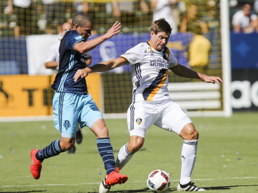 Midfielder Steven Gerrard (in white) in action for LA Galaxy. The former Liverpool captain will be welcomed back to Anfield when his Major League Soccer stint ends, says Reds manager Jurgen Klopp. Photo: AP