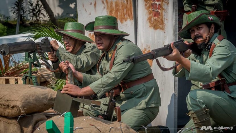 Wooden swords and replica rifles: History buffs in Indonesia recreate battles to honour national heroes