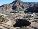 A sinkhole that was exposed last week has doubled in size, at a mining zone close to Tierra Amarilla town, in Copiapo, Chile, Aug 7, 2022. 