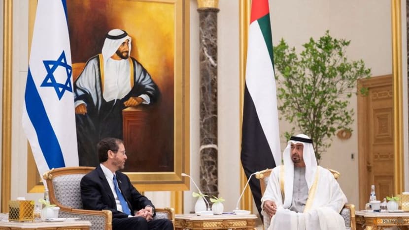 UAE intercepts a Houthi missile as Israeli president visits UAE intercepts a Houthi missile as Israeli president visits