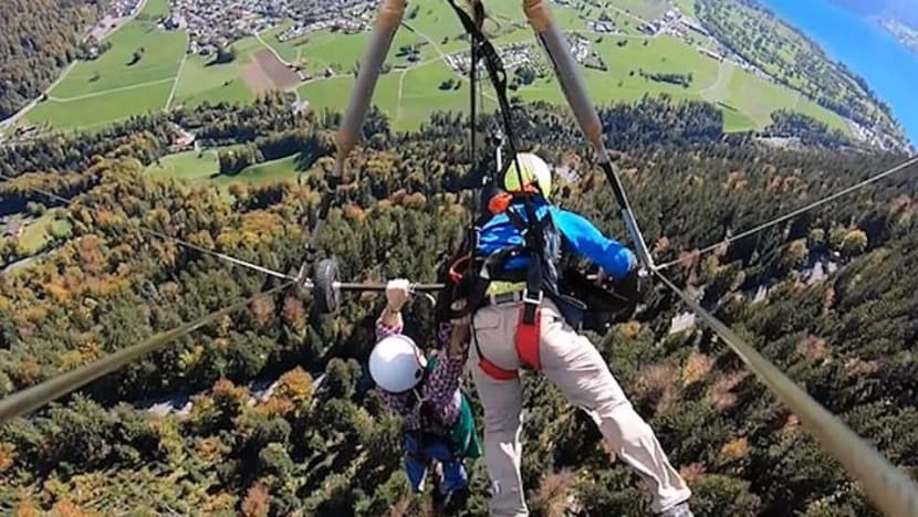 Man has near-death experience while hang gliding after pilot forgets to secure his harness Man has near-death experience while hang gliding after pilot forgets to secure his harness