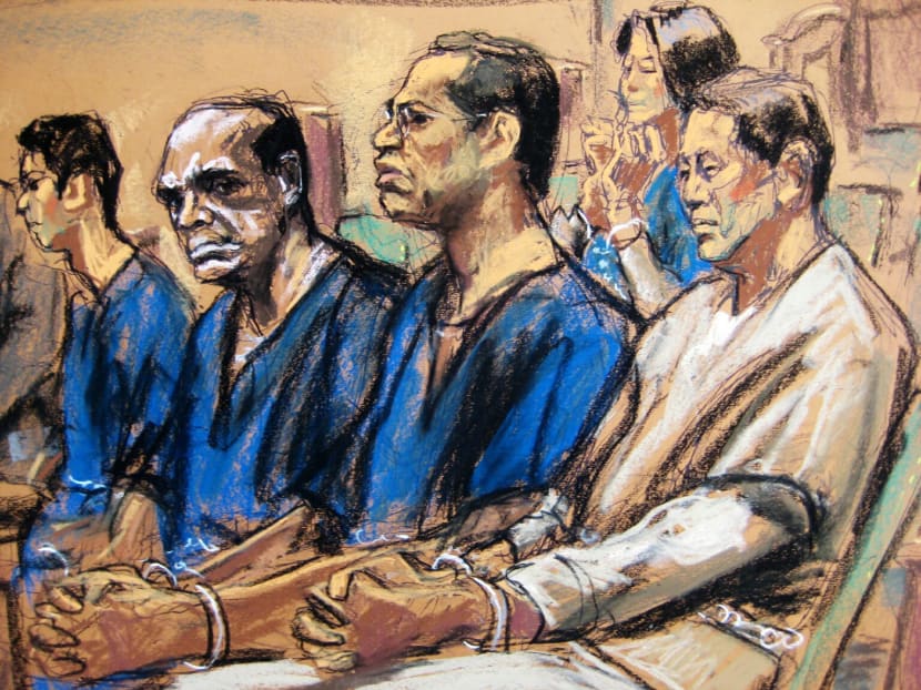Jeff Yin (L), John Ashe, Francis Lorenzo (2nd R) and Ng Lap Seng (R) along with Sheri Yan (back) are pictured seated in court in New York in this court sketch on Oct 22, 2015. Photo: Reuters