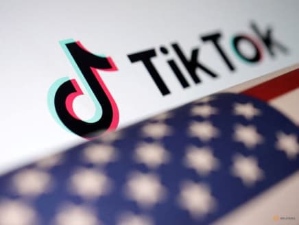 US flag is placed on a TikTok logo in this illustration taken on March 20, 2024.
