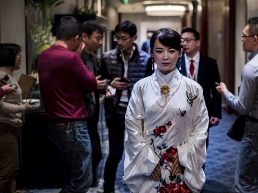 Humanoid robot Jia Jia, created by a team of engineers from the University of Science and Technology of China, is seen following a presentation at a conference in Shanghai on Jan 9, 2017. Photo: AFP